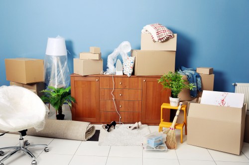 Organized household storage space in Lee with neatly packed boxes