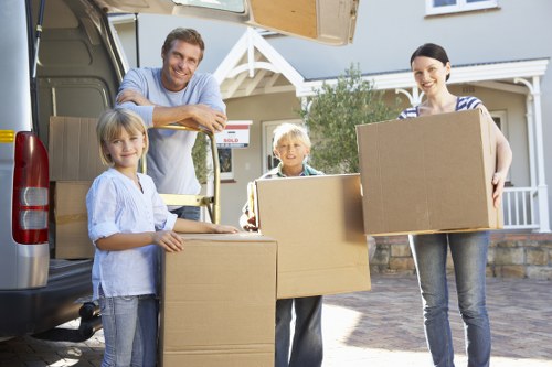 Professional movers handling a compact home relocation in Lee