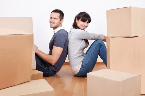Carefully packed sofa and table ready for furniture storage